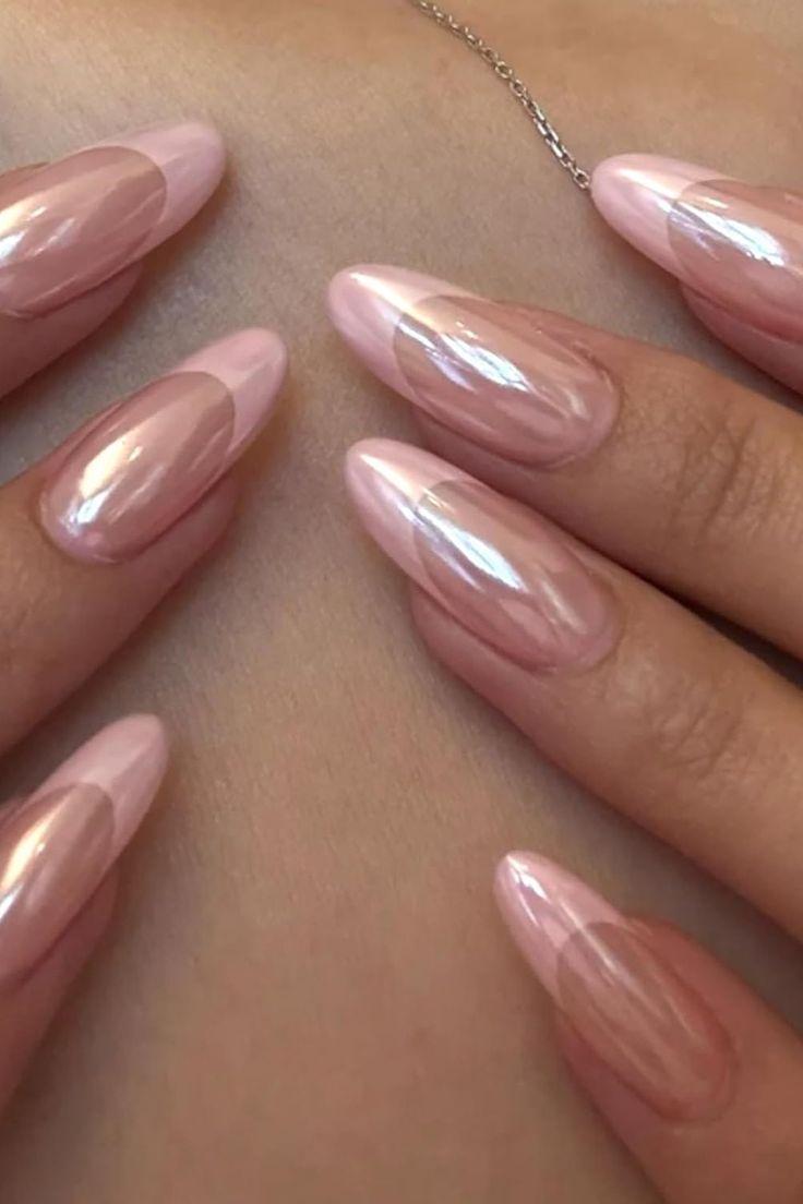 Elegant blush pink nails with a glossy chrome finish and mod